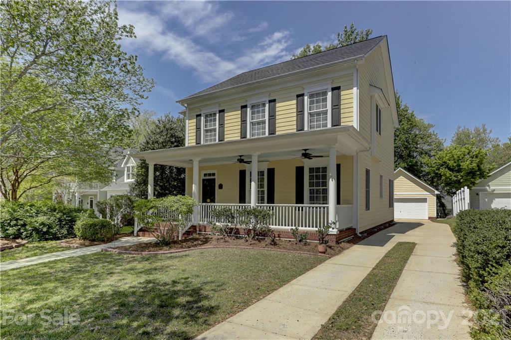 548 Glen Walk Drive Fort Mill, SC 29708 - Photo 3 of 48 a front view of a house with garden
