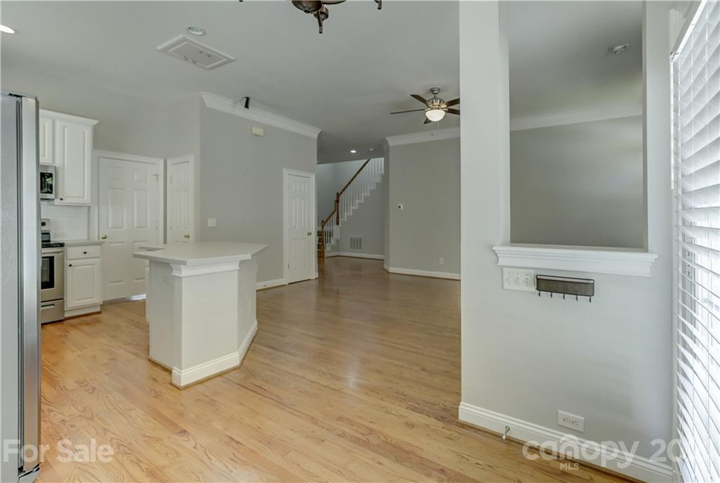 548 Glen Walk Drive Fort Mill, SC 29708 - Photo 26 of 48 a view of a kitchen with furniture and wooden floor