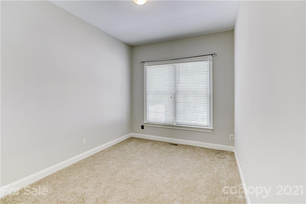 548 Glen Walk Drive Fort Mill, SC 29708 - Photo 27 of 48 an empty room with a window