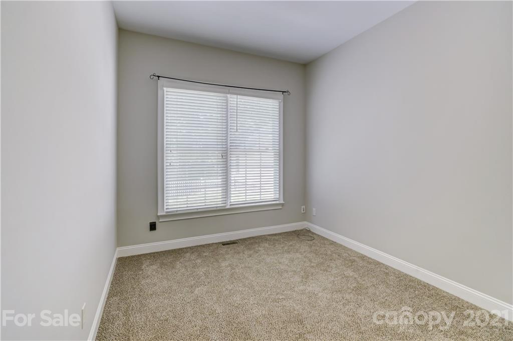548 Glen Walk Drive Fort Mill, SC 29708 - Photo 28 of 48 an empty room with a window