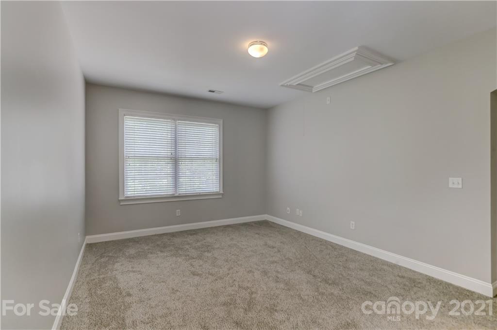 548 Glen Walk Drive Fort Mill, SC 29708 - Photo 30 of 48 wooden floor in an empty room with a window