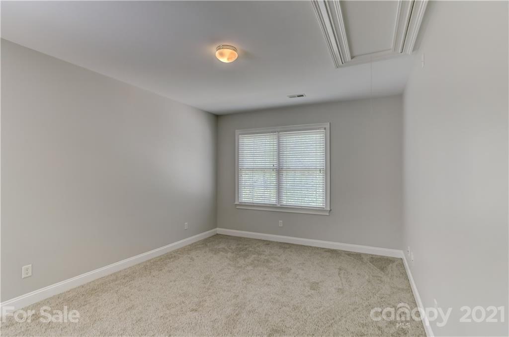 548 Glen Walk Drive Fort Mill, SC 29708 - Photo 31 of 48 an empty room with a window