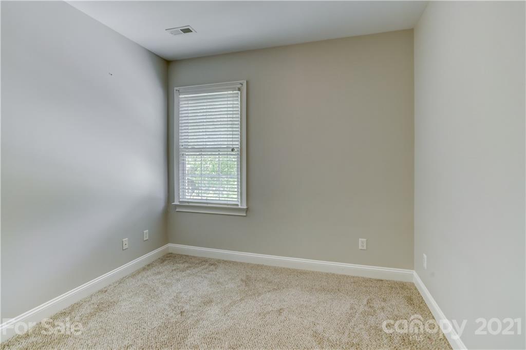 548 Glen Walk Drive Fort Mill, SC 29708 - Photo 35 of 48 an empty room with a window