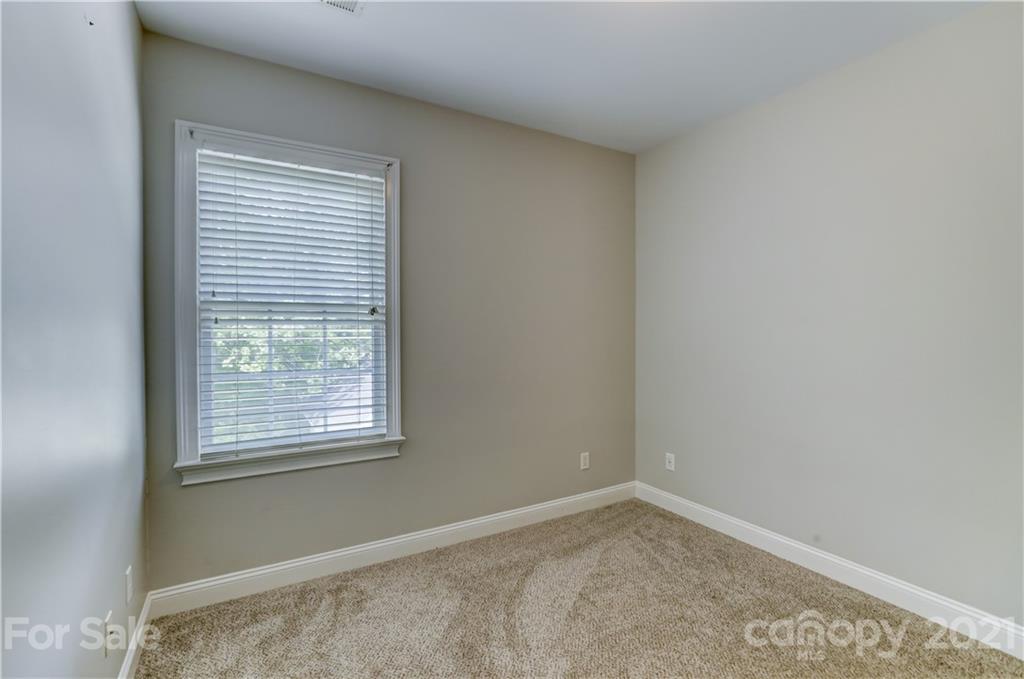 548 Glen Walk Drive Fort Mill, SC 29708 - Photo 36 of 48 a view of an empty room with a window