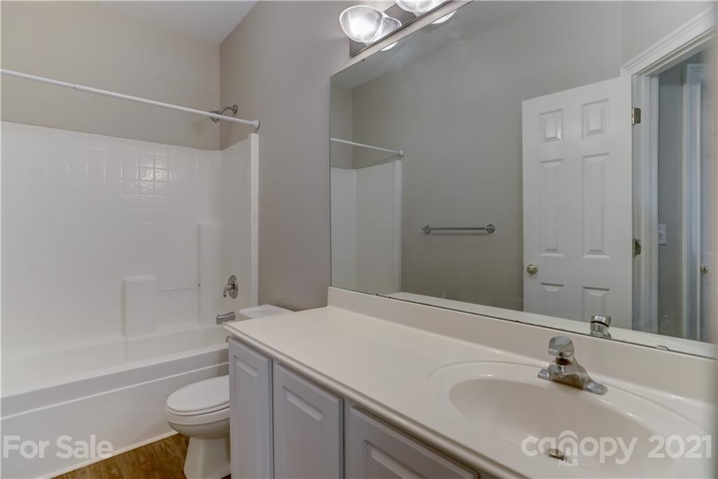 548 Glen Walk Drive Fort Mill, SC 29708 - Photo 37 of 48 a bathroom with a sink a toilet and a bathtub
