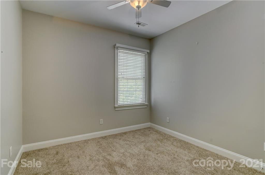 548 Glen Walk Drive Fort Mill, SC 29708 - Photo 38 of 48 an empty room with a window