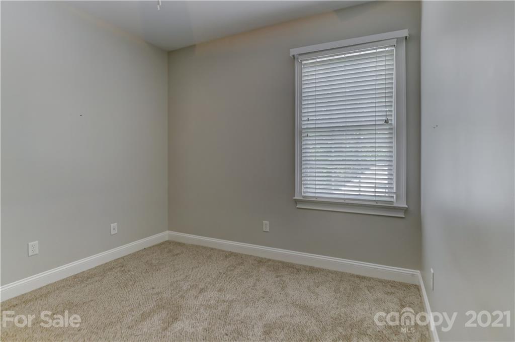 548 Glen Walk Drive Fort Mill, SC 29708 - Photo 39 of 48 an empty room with a window
