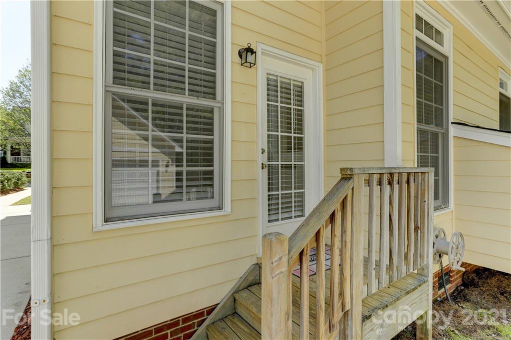 548 Glen Walk Drive Fort Mill, SC 29708 - Photo 43 of 48 a view of balcony with stairs and white door