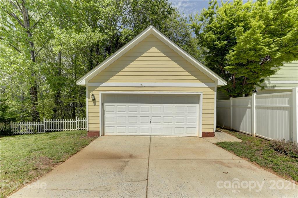 548 Glen Walk Drive Fort Mill, SC 29708 - Photo 48 of 48 a view of a small house with a small yard and large tree