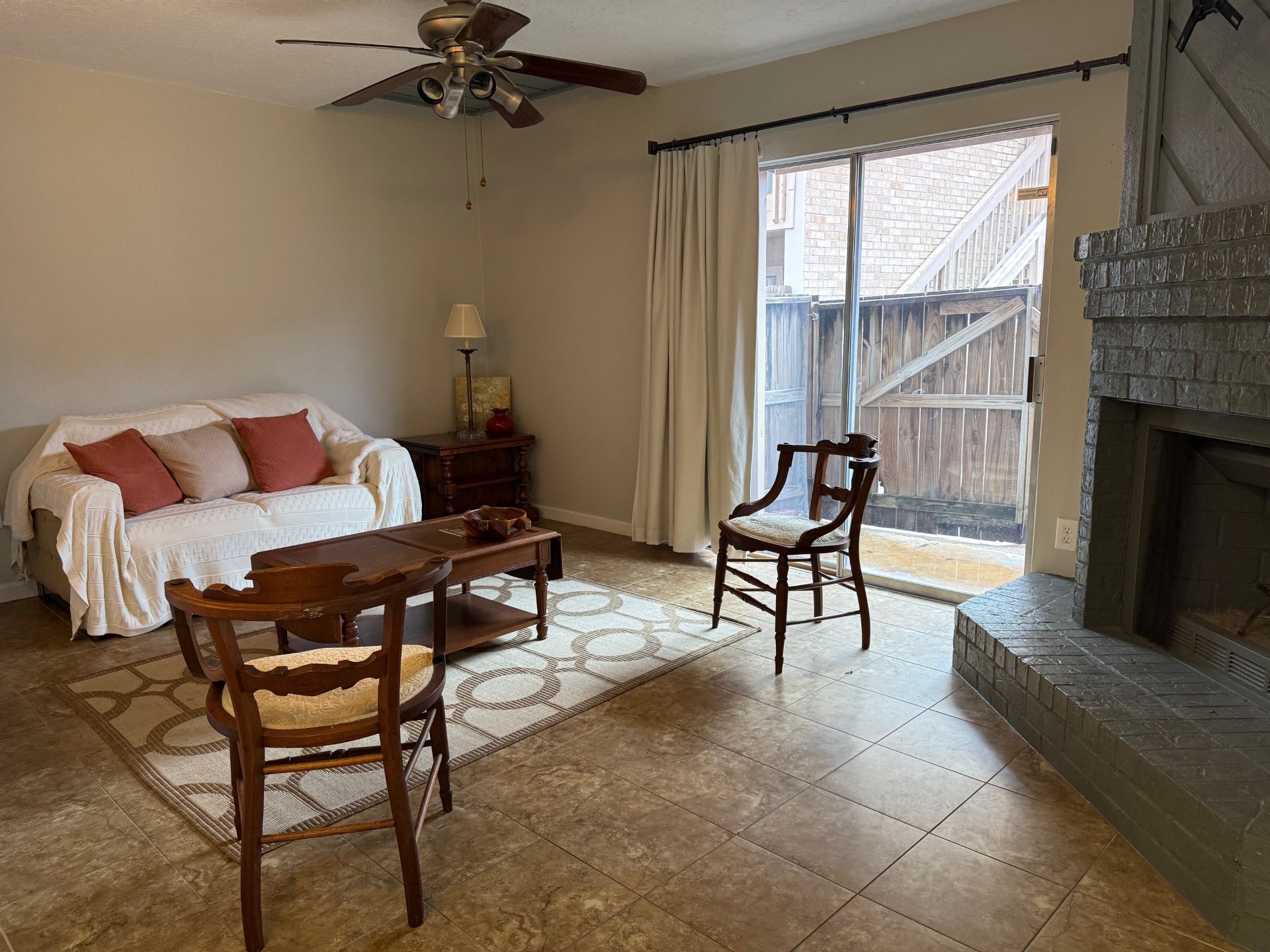 1505 Ward Road, Unit 189 Baytown, TX 77520 - Photo 3 of 14 a living room with furniture and a fireplace