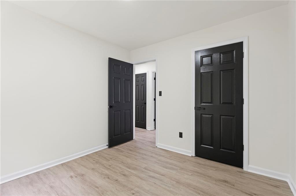 3602 Bristol Overlook Rex, GA 30273 - Photo 19 of 37 a view of an empty room with wooden floor