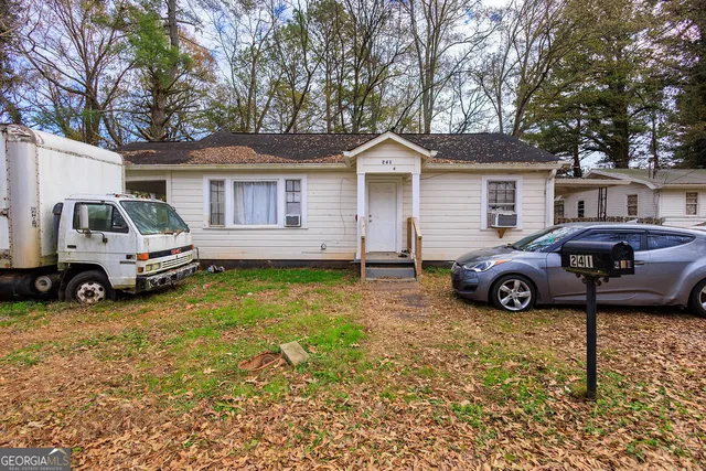 a view of a car in front of house