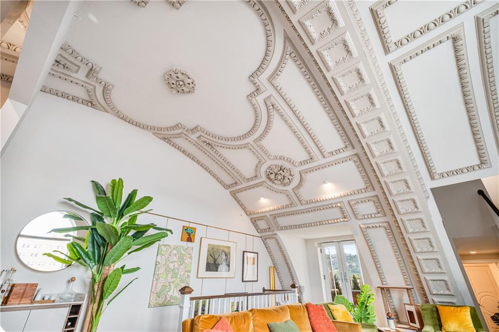 2132 Sarah Street, Unit 207 Pittsburgh, PA 15203 - Photo 11 of 50 Living under these ceilings would be a daily experience of grandeur and awe. Each day, you'd be surrounded by an incredible work of art, with the intricate, historic detailing of the ceiling transforming your home into a truly unique and luxurious space.