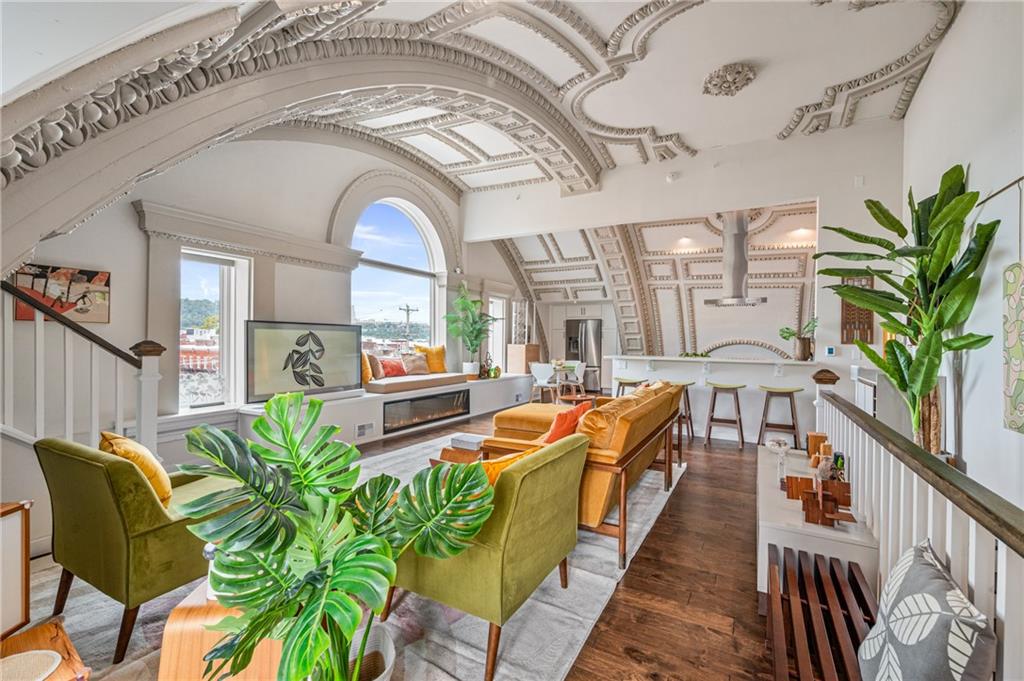 2132 Sarah Street, Unit 207 Pittsburgh, PA 15203 - Photo 6 of 50 The ceilings create a sense of scale and elegance that you won't find in a typical condo. The light plays off the moldings, highlighting the meticulous craftsmanship.