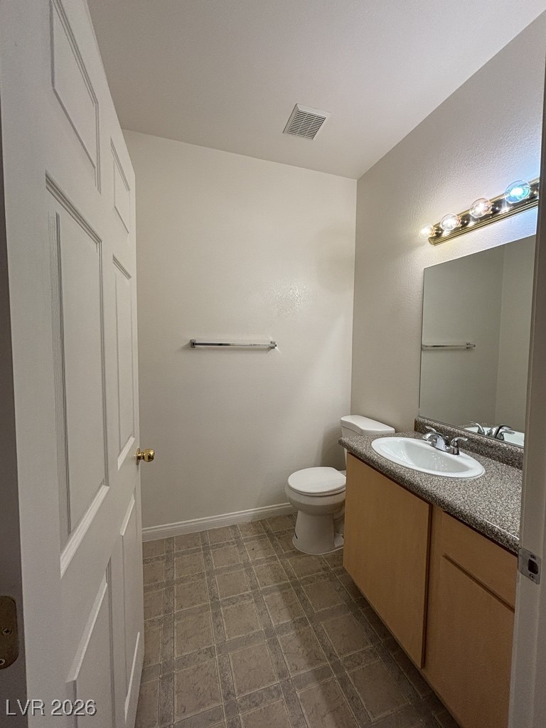 4915 East Russell Road, Unit 140 Las Vegas, NV 89120 - Photo 5 of 9 Half bathroom downstairs