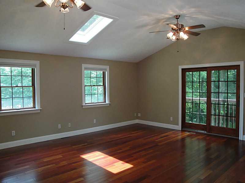 989 Logan Road Gibsonia, PA 15044 - Photo 4 of 22 Family Room. Brazilian Hardwood Floors, 2 Skylights, Anderson Wood Windows - Attic Storage
