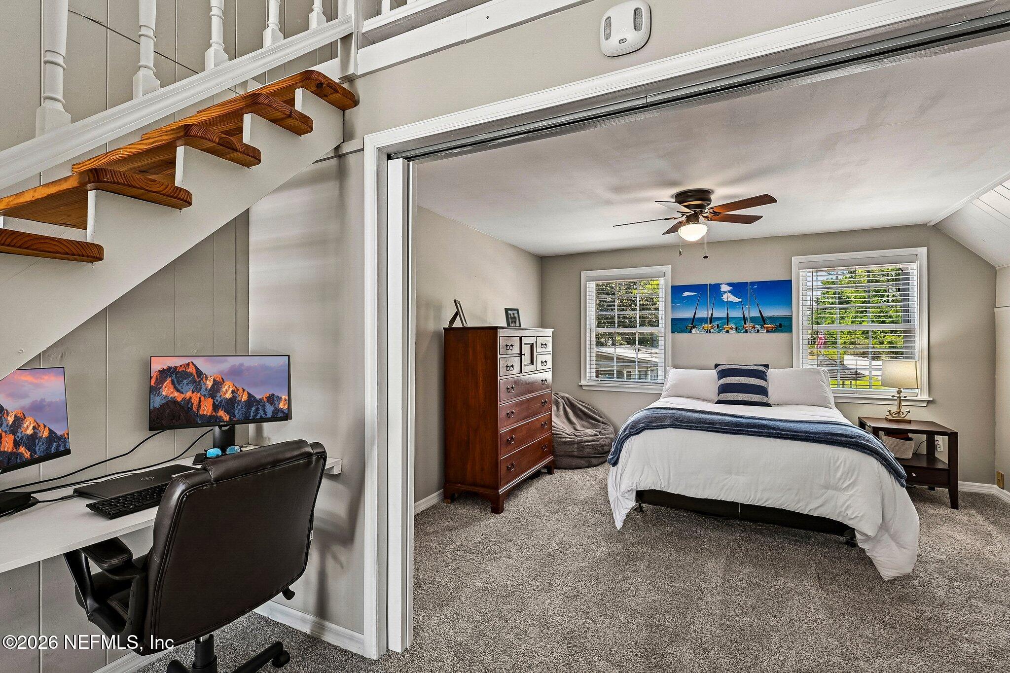 4745 Raggedy Point Road Fleming Island, FL 32003 - Photo 41 of 106 a bed room with a bed and furniture