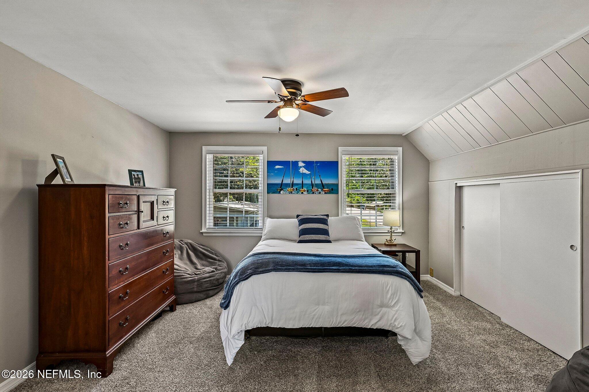 4745 Raggedy Point Road Fleming Island, FL 32003 - Photo 45 of 106 a bed room with a bed and a window