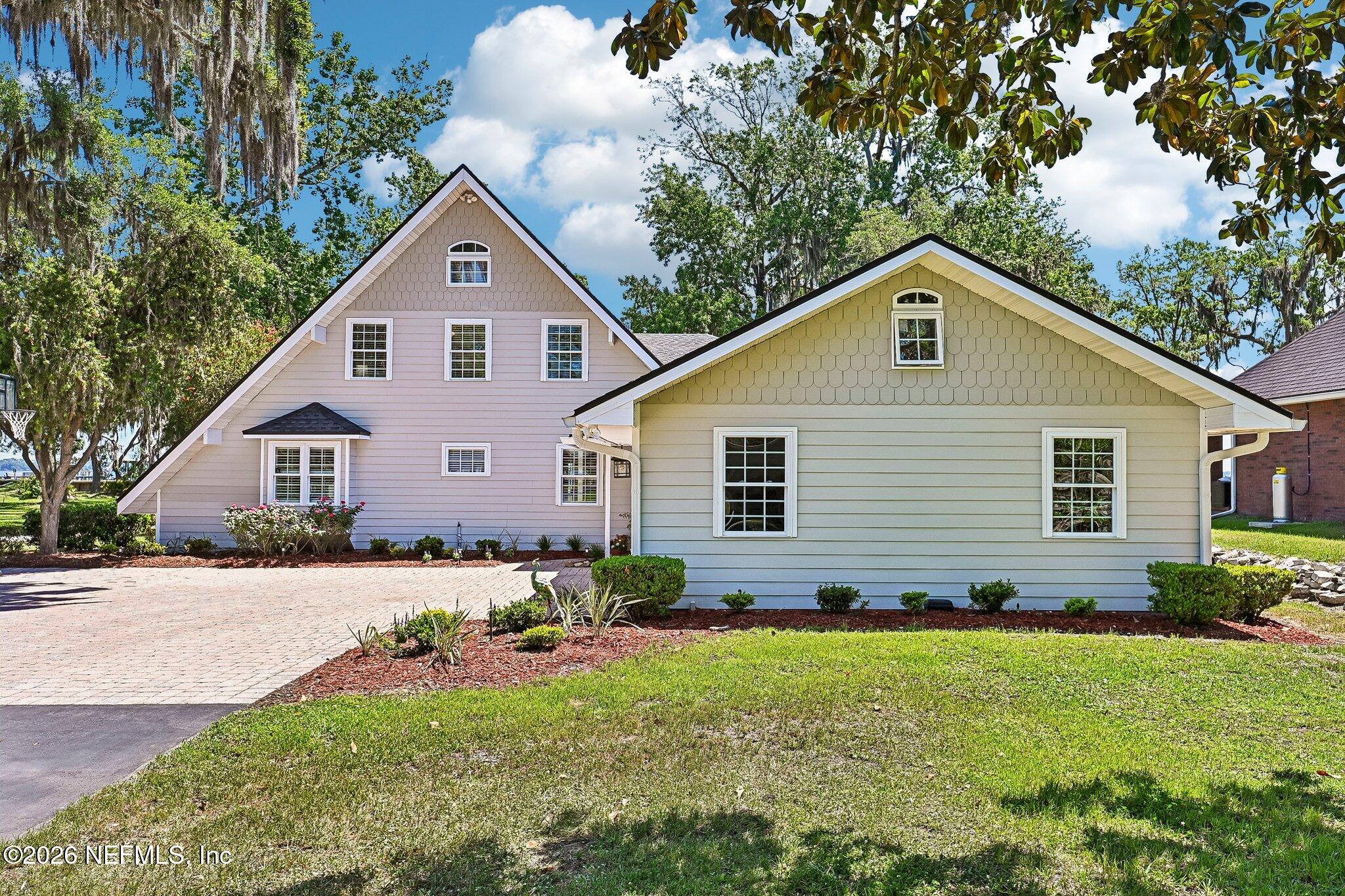 4745 Raggedy Point Road Fleming Island, FL 32003 - Photo 88 of 106 a view of a backyard of the house