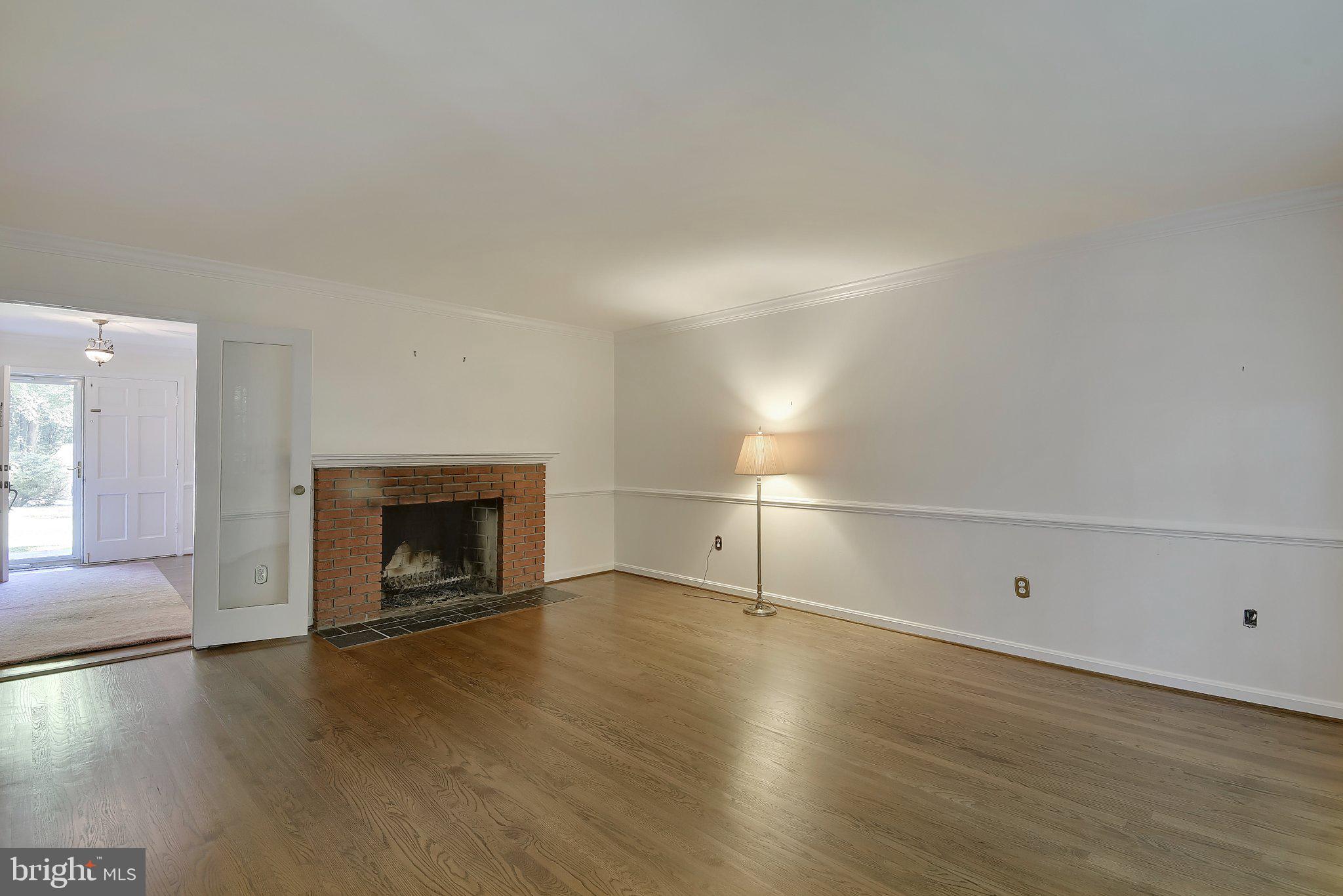 2025 Post Road Vienna, VA 22181 - Photo 10 of 24 Living Room with Gas Fireplace