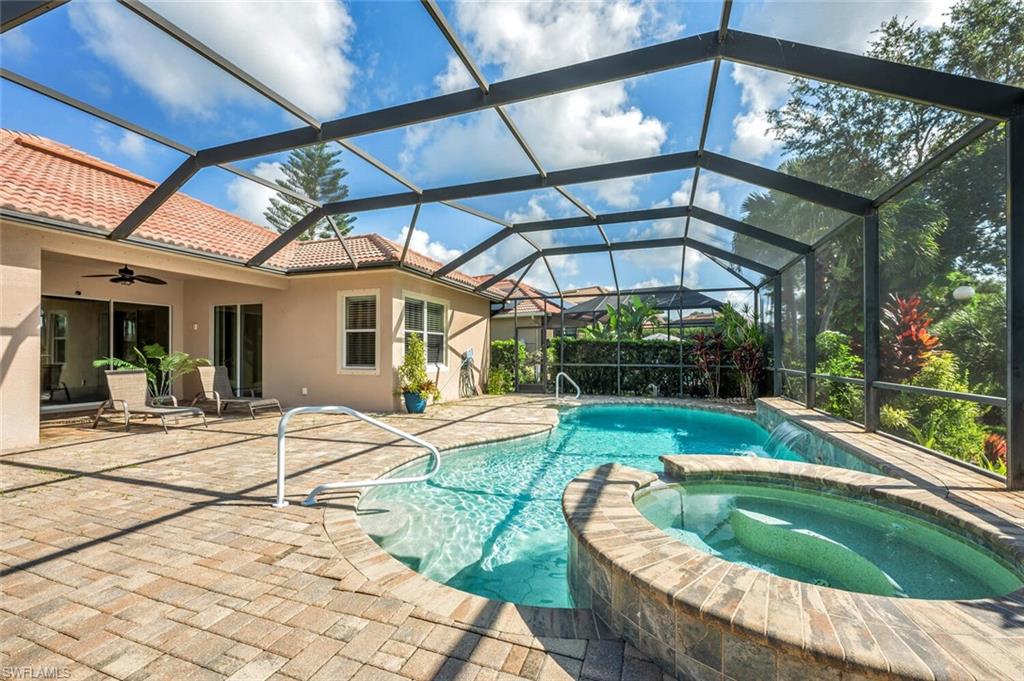 8237 Valiant Drive Naples, FL 34104 - Photo 29 of 35 View of pool featuring a lanai, a patio area, an in ground hot tub, and ceiling fan