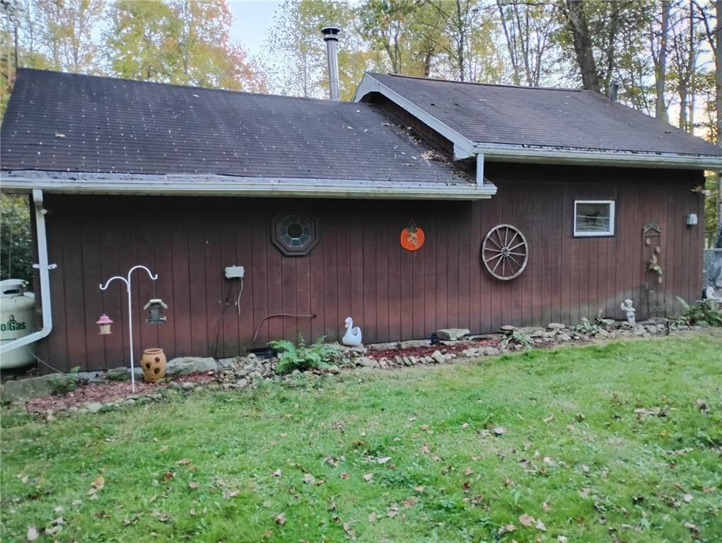 950 Springfield Road Penn Run, PA 15765 - Photo 9 of 16 a front view of a house with garden