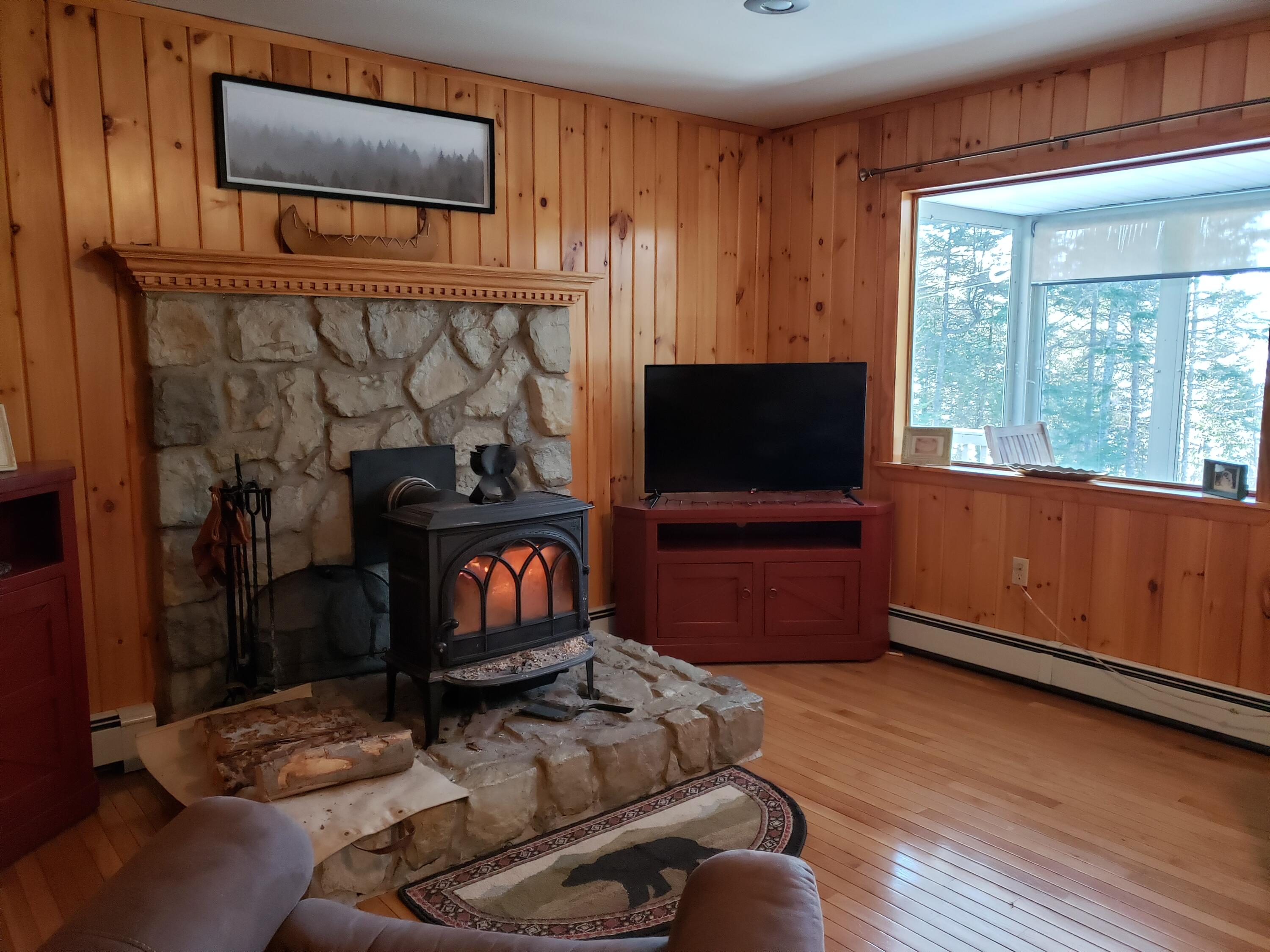 18 Deer Run Road Greenville, ME 04441 - Photo 32 of 66 Living Room - Porch View