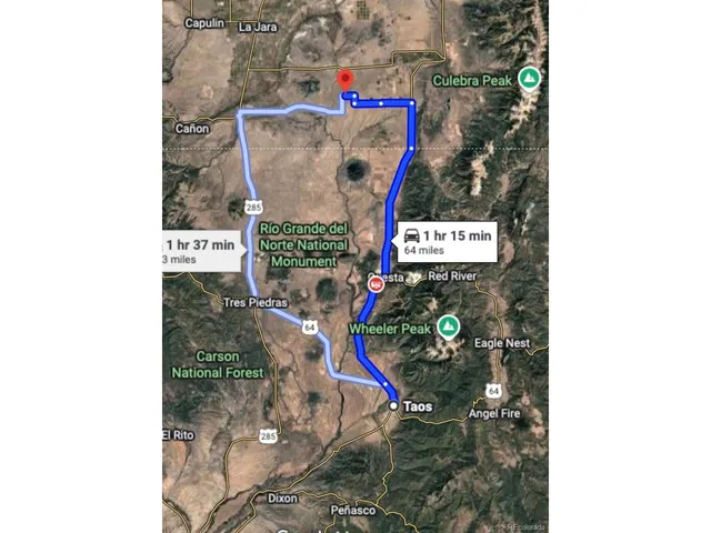 a sign board with a outdoor space