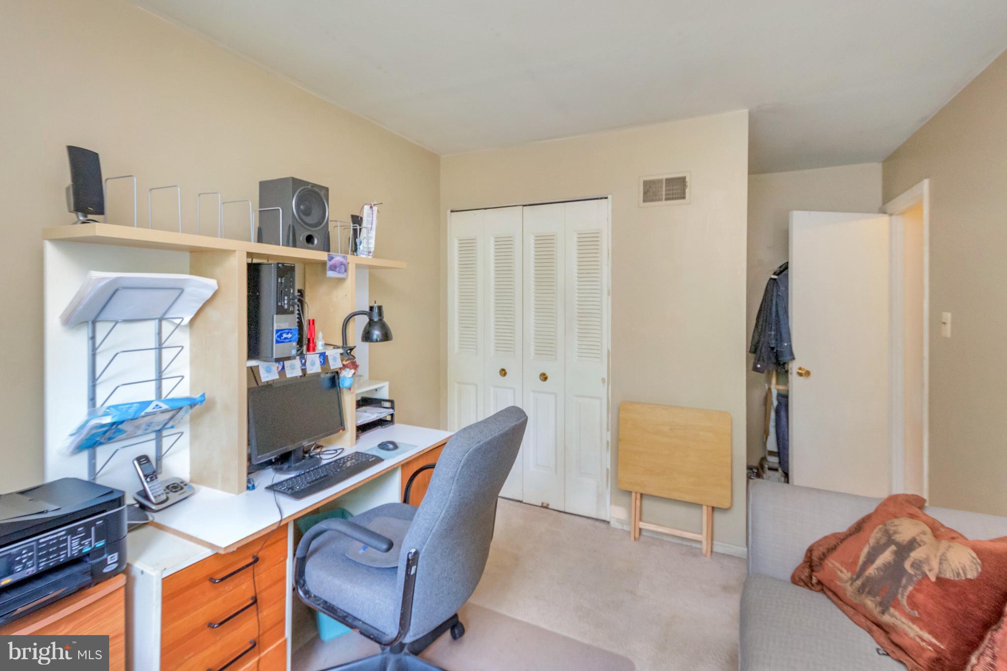 4717 Kilbane Road Woodbridge, VA 22193 - Photo 16 of 29 a view of a livingroom with furniture and a window