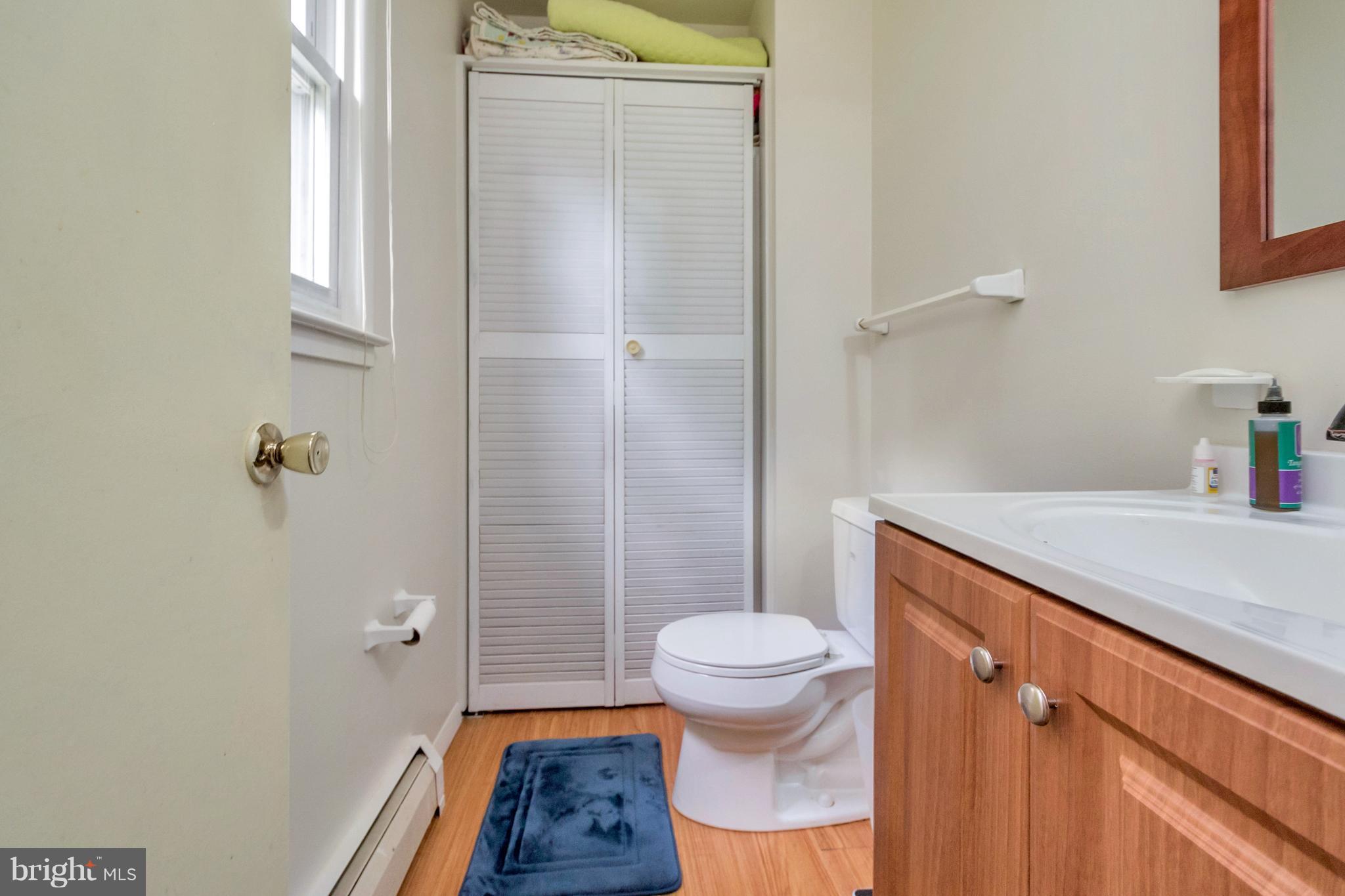 4717 Kilbane Road Woodbridge, VA 22193 - Photo 18 of 29 a bathroom with a sink and toilet