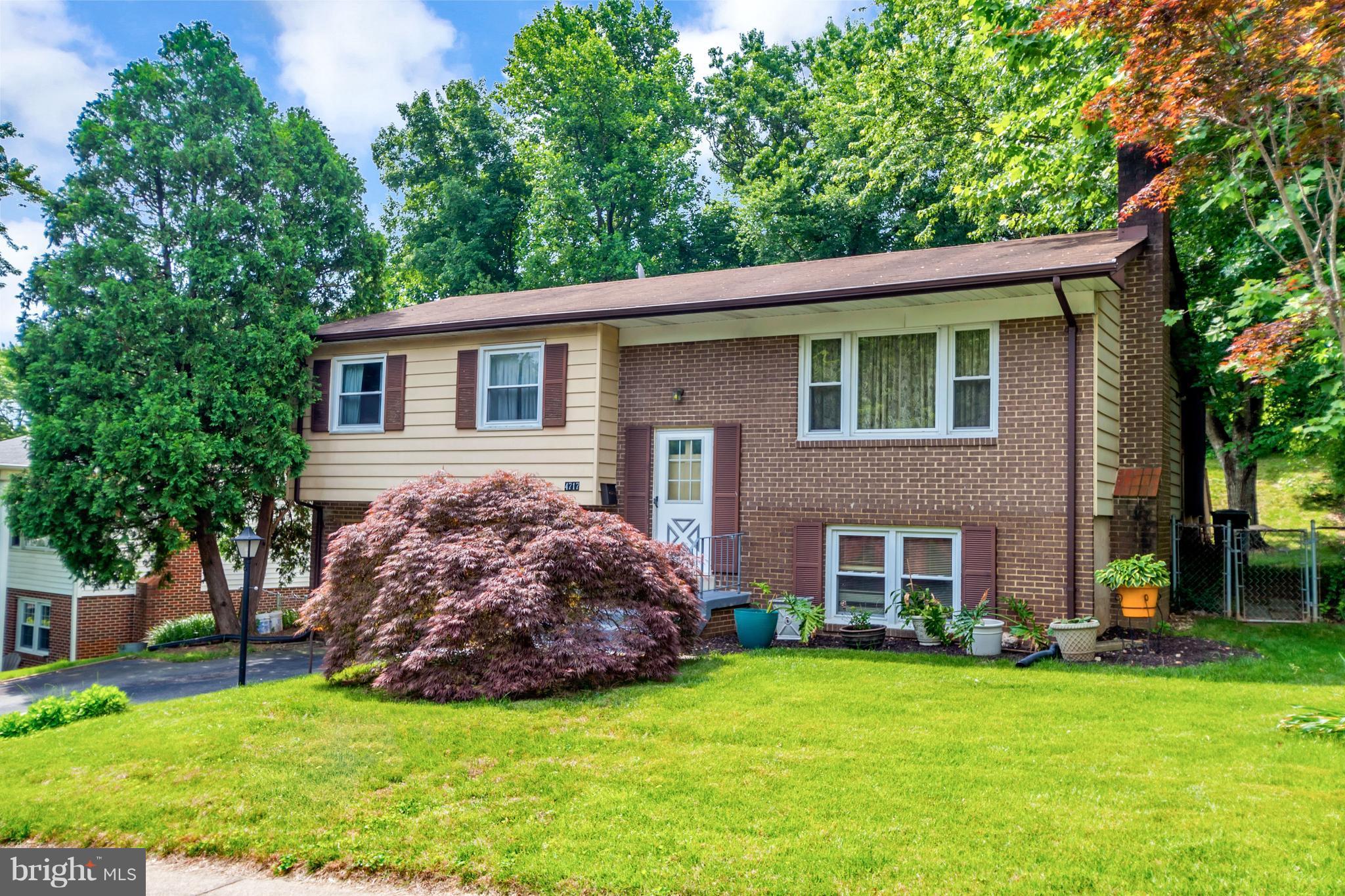 4717 Kilbane Road Woodbridge, VA 22193 - Photo 2 of 29 a view of a house with a yard
