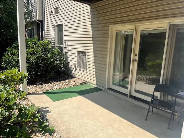 a view of backyard with porch
