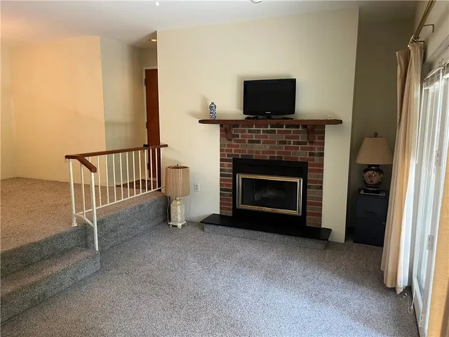 a view of a livingroom with a fireplace