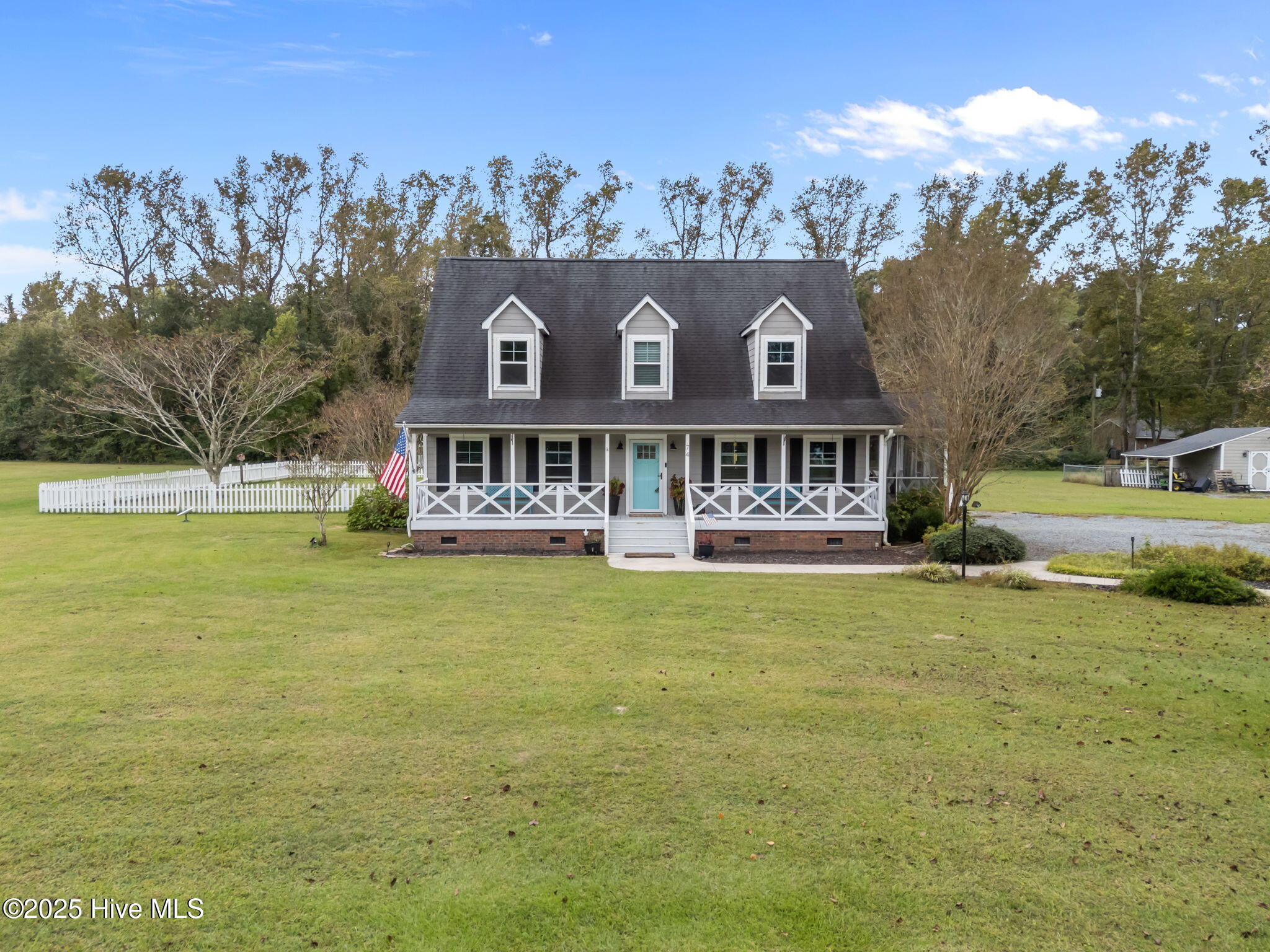 74 South Hummingbird Lane Rocky Point, NC 28457 - Photo 2 of 38 2-web-or-mls-DJI_20251010124922_0617_D