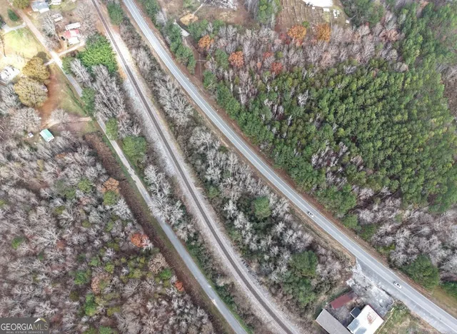 a view of a garden from a balcony
