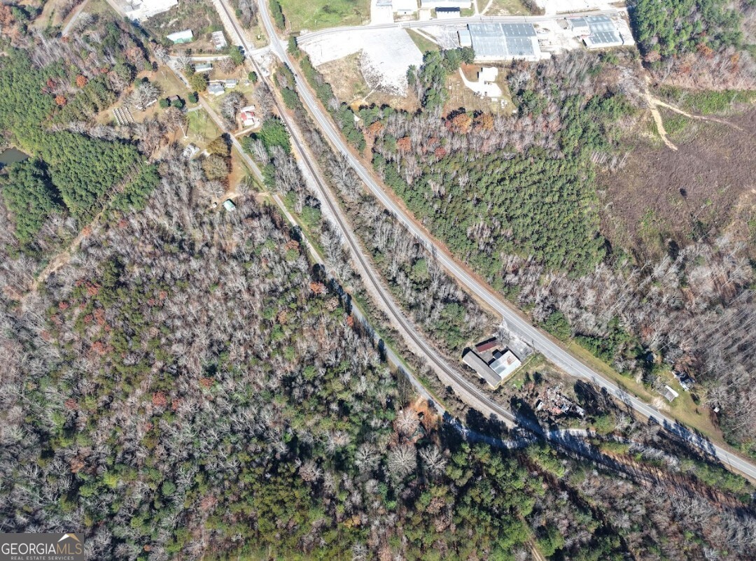 0 Highway 13 Haleyville, AL 35565 - Photo 9 of 13 a city view with tall trees