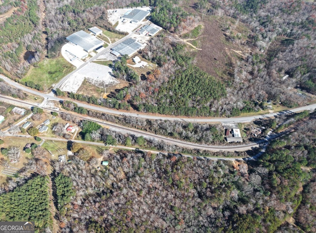 0 Highway 13 Haleyville, AL 35565 - Photo 10 of 13 a picture of a tree with a wooden fence