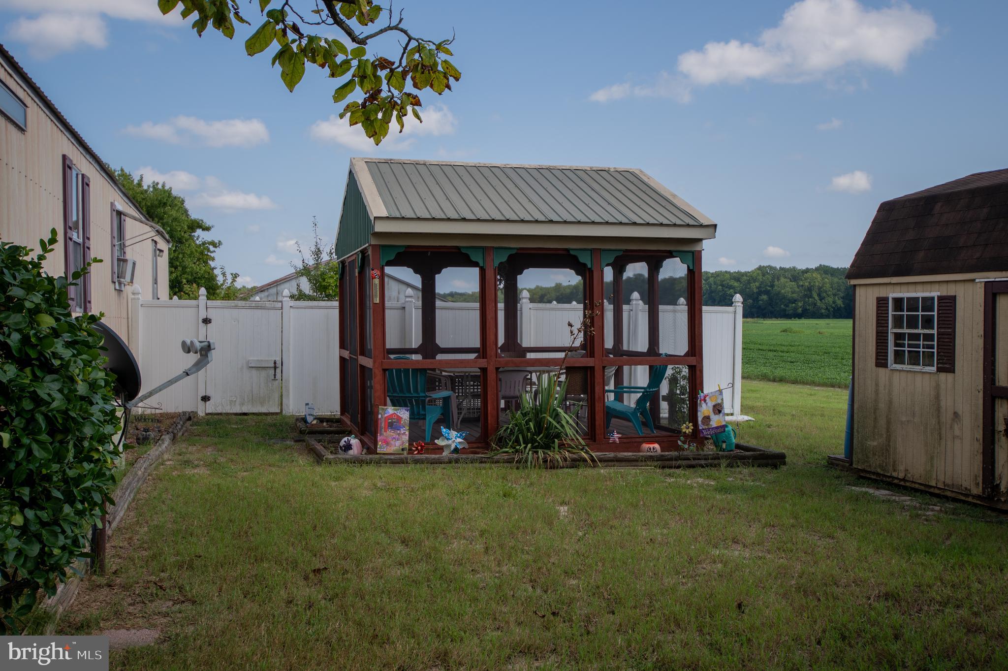 37245 Firemans Road Millsboro, DE 19966 - Photo 25 of 31 front view of house with a yard