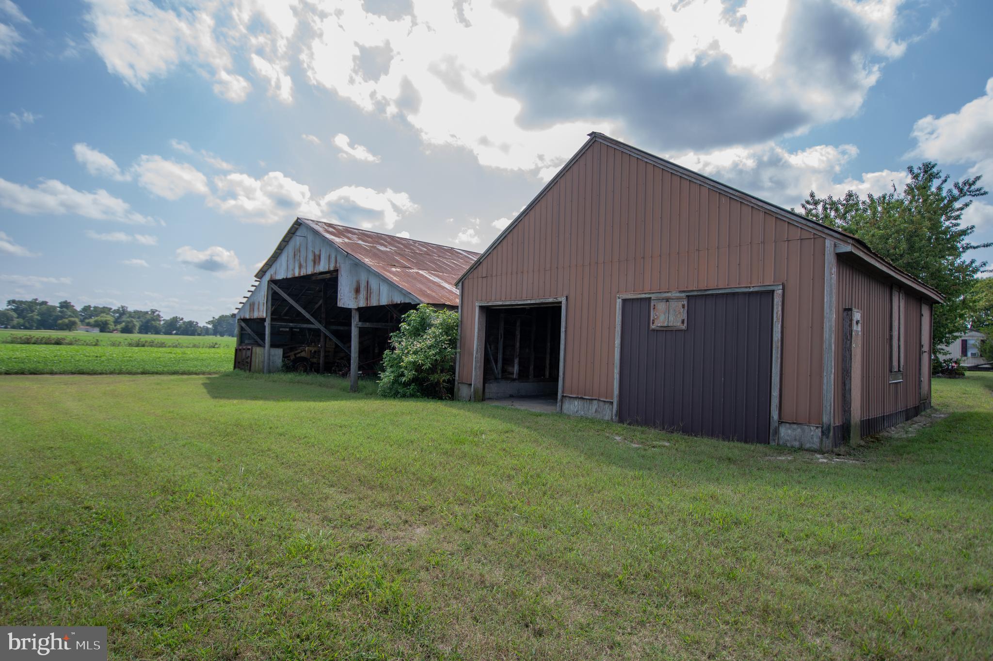 37245 Firemans Road Millsboro, DE 19966 - Photo 30 of 31 a view of a house with backyard and garden