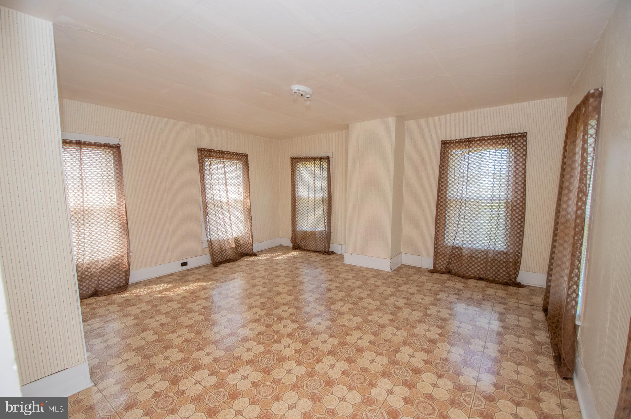 37245 Firemans Road Millsboro, DE 19966 - Photo 8 of 31 a view of an empty room with window and closet area