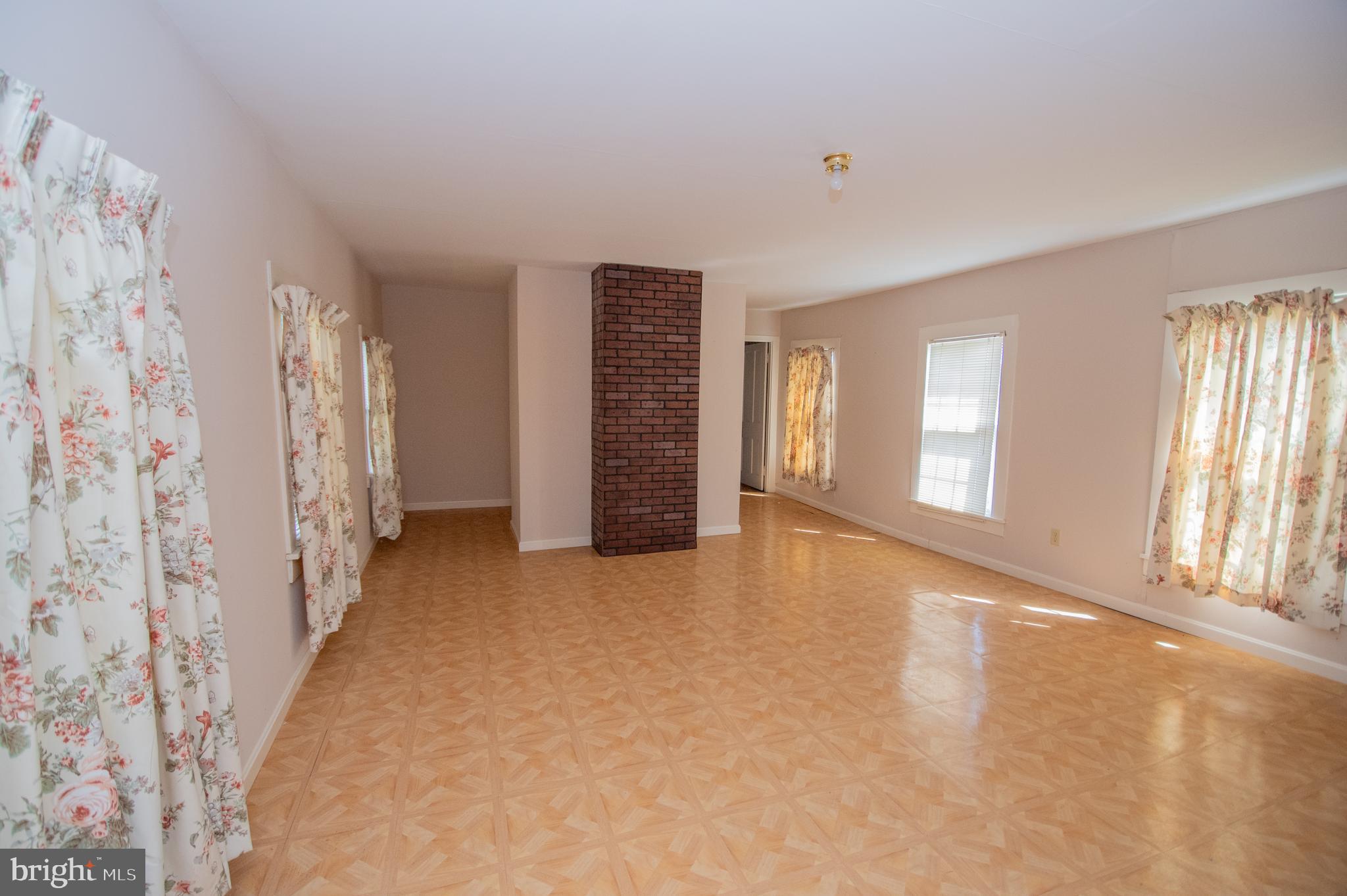 37245 Firemans Road Millsboro, DE 19966 - Photo 10 of 31 a view of an empty room with a window