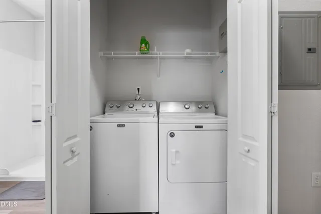a utility room with dryer and washer