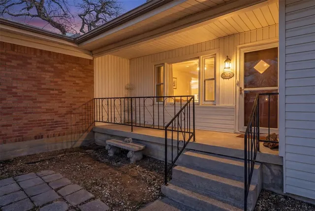 a view of a door with a bench