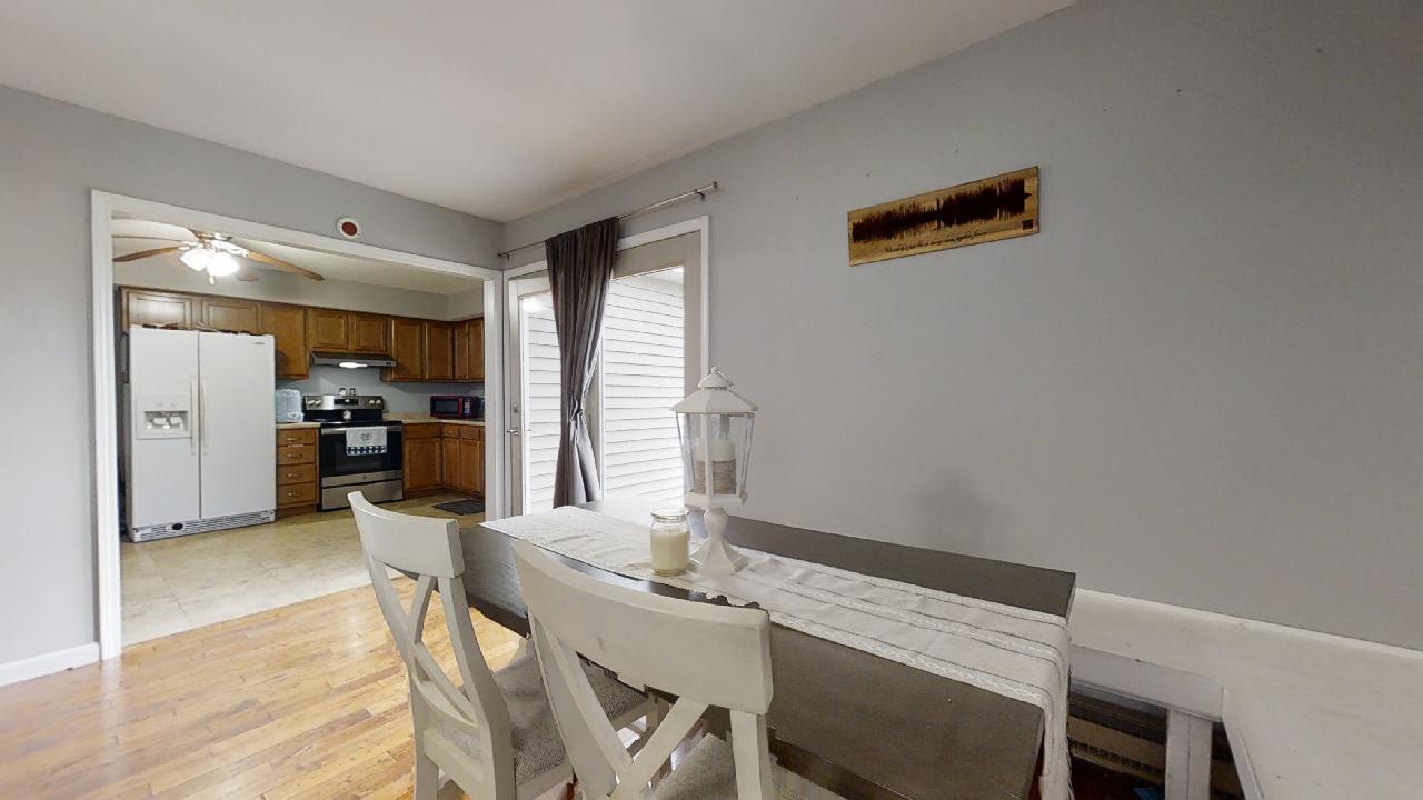 405 Park Circle St. Joseph, IL 61873 - Photo 11 of 35 a view of a dining room with furniture and window