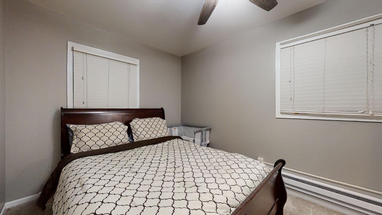 405 Park Circle St. Joseph, IL 61873 - Photo 18 of 35 a bedroom with a bed and window