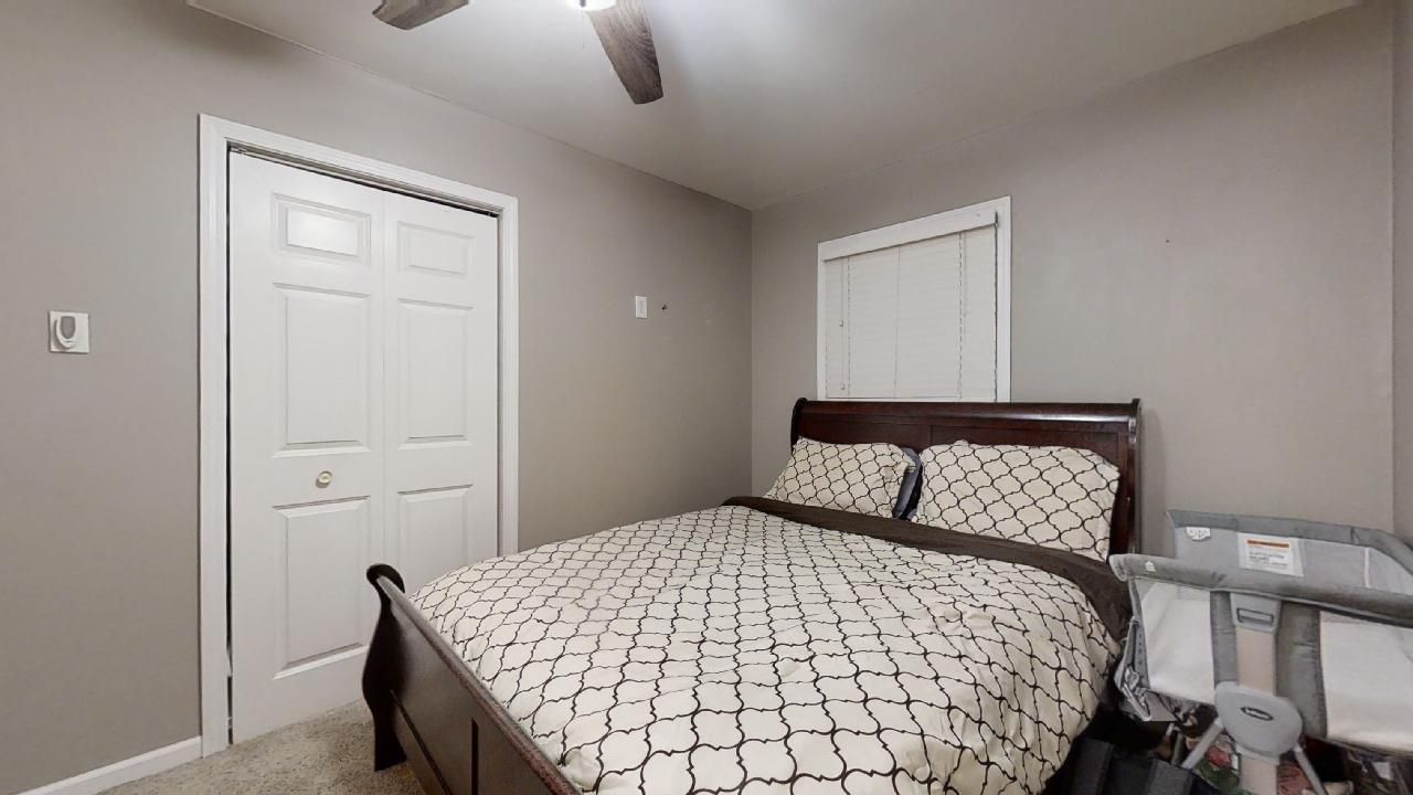 405 Park Circle St. Joseph, IL 61873 - Photo 19 of 35 a bedroom with a bed and window