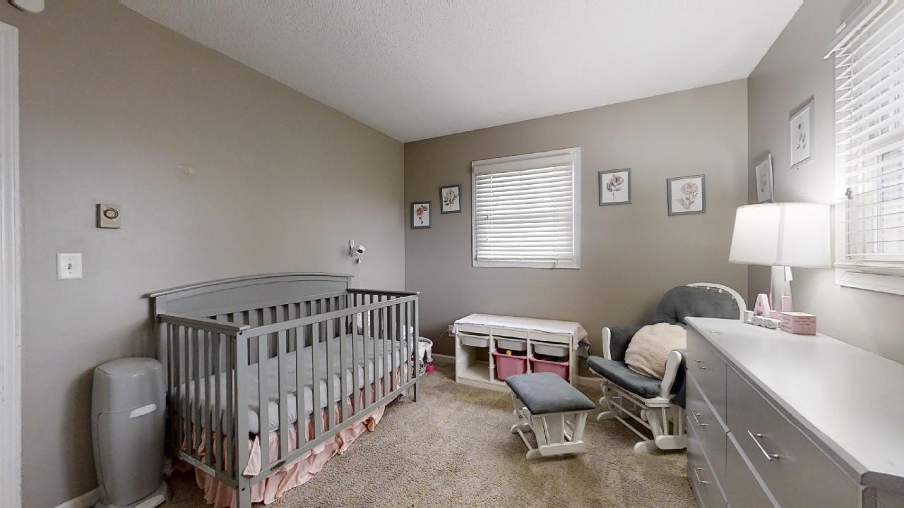 405 Park Circle St. Joseph, IL 61873 - Photo 23 of 35 a bedroom with furniture and a window