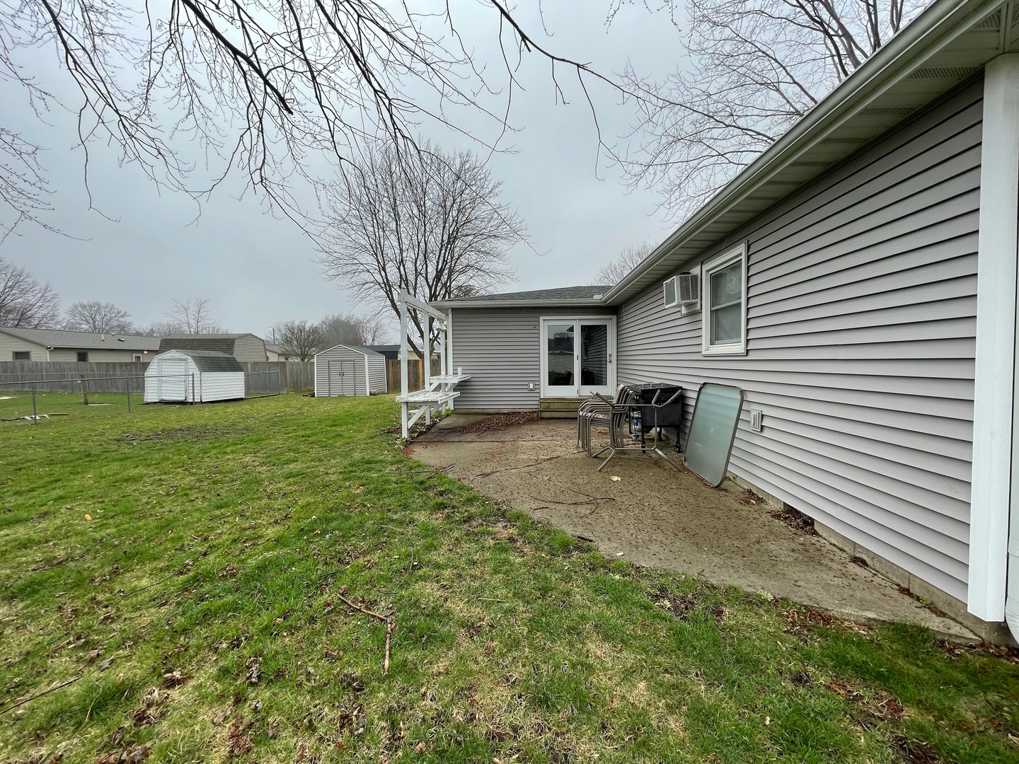 405 Park Circle St. Joseph, IL 61873 - Photo 27 of 35 a view of a backyard with sitting area