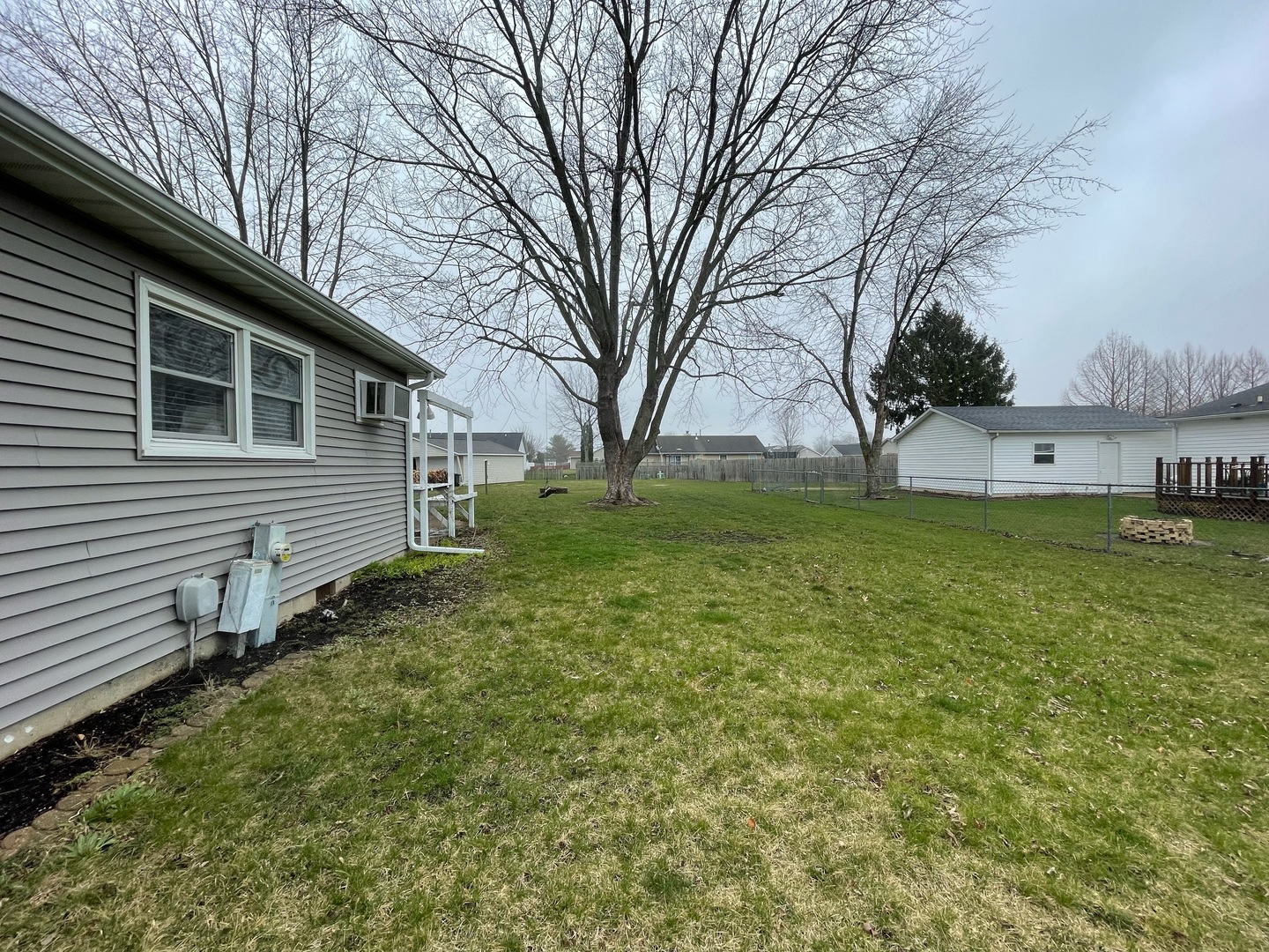 405 Park Circle St. Joseph, IL 61873 - Photo 28 of 35 a view of a house with a yard