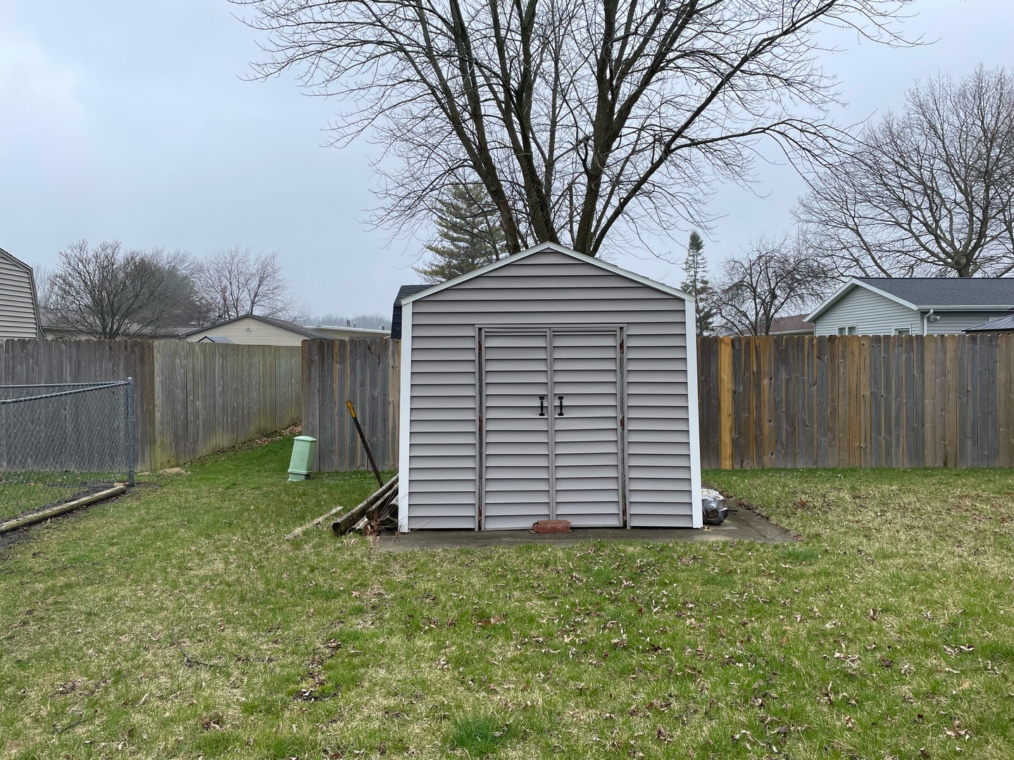 405 Park Circle St. Joseph, IL 61873 - Photo 34 of 35 a front view of a house with a garden